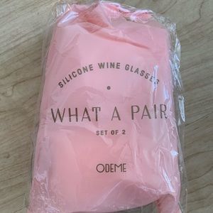 Never opened set of 2 pink silicone wine glasses